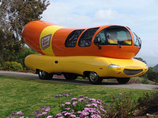 Illustration for article titled Ten-Pack Of Dogs: History Of The Wienermobile